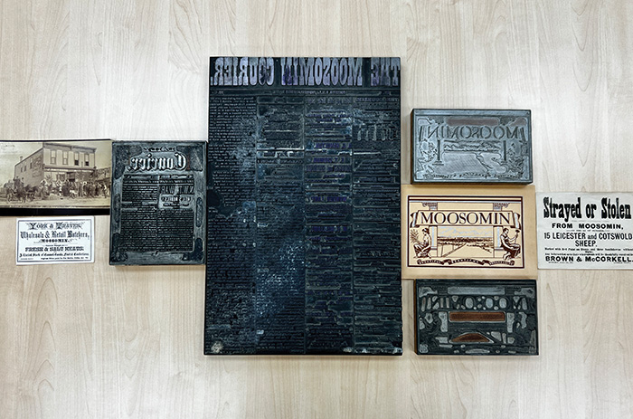 Just a few of the artifacts from the World-Spectator’s history, including early posters, business cards, photos, and printing plates.<br />